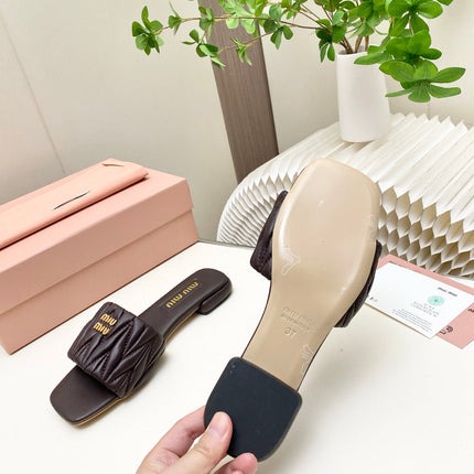 MIUMIU 26S MATELASSE SLIDES IN DARK BROWN CALFSKIN