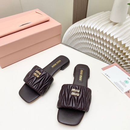 MIUMIU 26S MATELASSE SLIDES IN DARK BROWN CALFSKIN