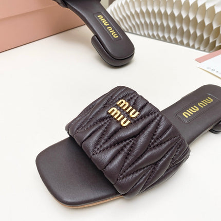 MIUMIU 26S MATELASSE SLIDES IN DARK BROWN CALFSKIN