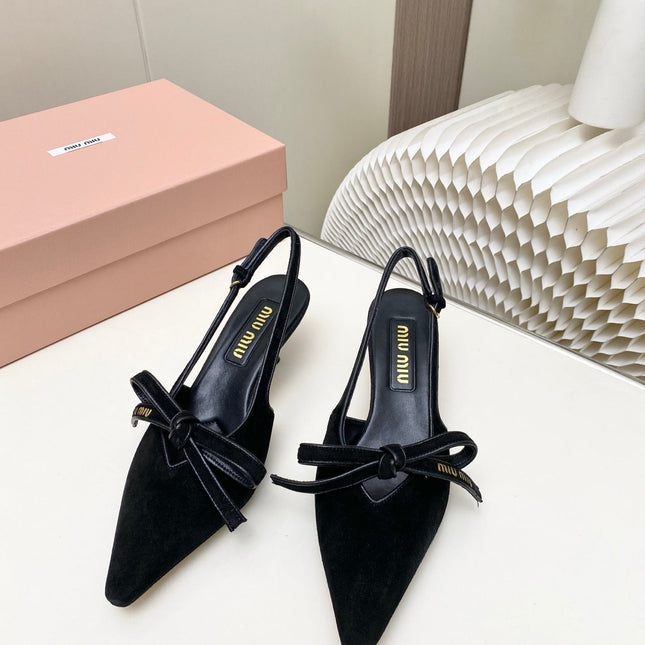 MIUMIU 26S SLINGBACK PUMPS 55MM IN BLACK SUEDE WITH BOW