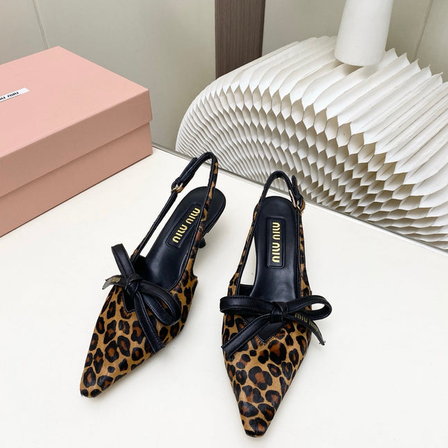 MIUMIU 26S SLINGBACK PUMPS 55MM IN LEOPARD PRINT CALF HAIR WITH BOW
