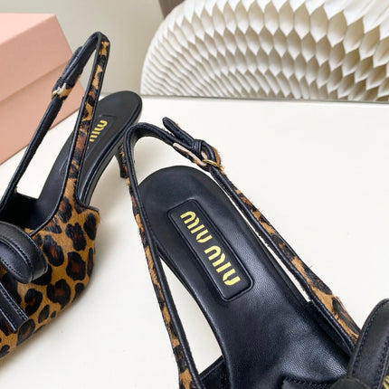 MIUMIU 26S SLINGBACK PUMPS 55MM IN LEOPARD PRINT CALF HAIR WITH BOW