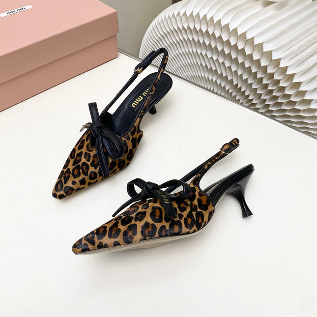 MIUMIU 26S SLINGBACK PUMPS 55MM IN LEOPARD PRINT CALF HAIR WITH BOW