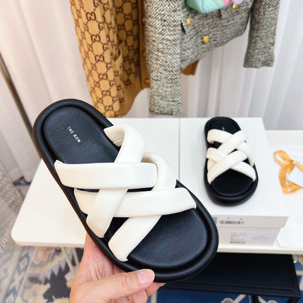 THE ROW 26S CROSSED PADDED SLIDES IN WHITE CALFSKIN