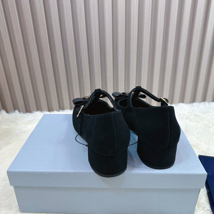 PRADA 26S T-STRAP MARY JANE PUMPS 40MM IN BLACK SUEDE WITH BOW