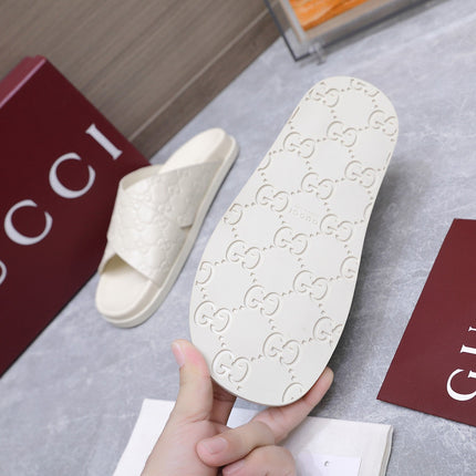 GUCCI 26S CROSSOVER SANDALS IN WHITE GG EMBOSSED CALFSKIN
