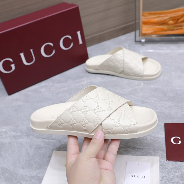 GUCCI 26S CROSSOVER SANDALS IN WHITE GG EMBOSSED CALFSKIN