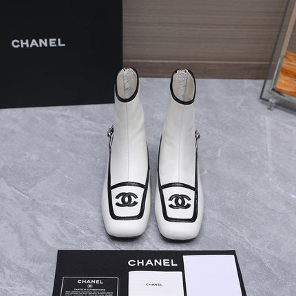 CHANEL 26S ANKLE BOOTS IN WHITE CALFSKIN WITH BLACK PATENT LEATHER TRIM AND CC LOGO ON TOE CAP