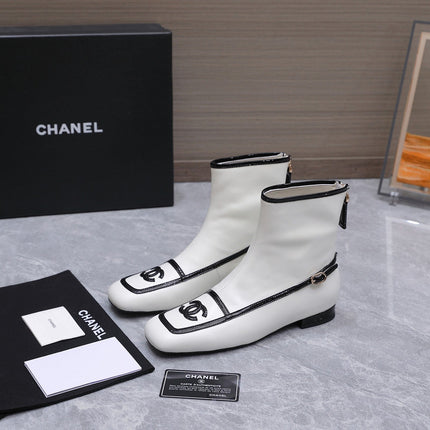 CHANEL 26S ANKLE BOOTS IN WHITE CALFSKIN WITH BLACK PATENT LEATHER TRIM AND CC LOGO ON TOE CAP