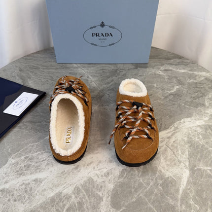 PRADA 26S WOVEN MULES IN COGNAC BROWN SUEDE