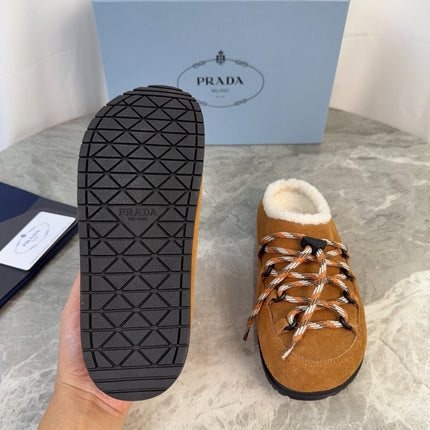 PRADA 26S WOVEN MULES IN COGNAC BROWN SUEDE