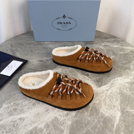 PRADA 26S WOVEN MULES IN COGNAC BROWN SUEDE