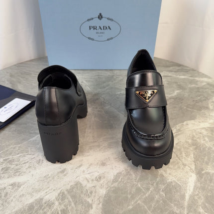 PRADA 26S HEELED LOAFERS 85 MM IN BLACK SMOOTH CALFSKIN