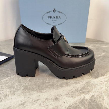 PRADA 26S HEELED LOAFERS 85 MM IN BLACK SMOOTH CALFSKIN