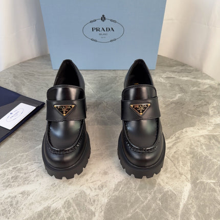 PRADA 26S HEELED LOAFERS 85 MM IN BLACK SMOOTH CALFSKIN