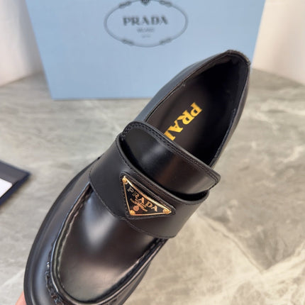 PRADA 26S HEELED LOAFERS 85 MM IN BLACK SMOOTH CALFSKIN