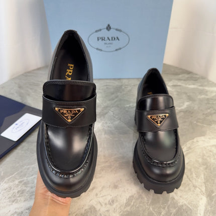 PRADA 26S HEELED LOAFERS 85 MM IN BLACK SMOOTH CALFSKIN