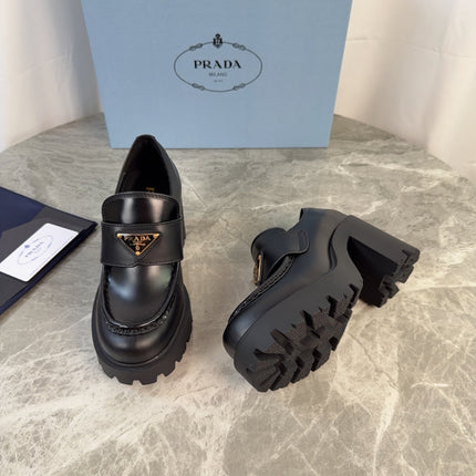 PRADA 26S HEELED LOAFERS 85 MM IN BLACK SMOOTH CALFSKIN