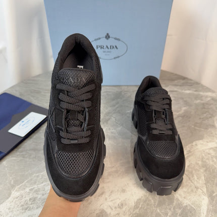 PRADA 26S GEAR SOLE SNEAKERS IN BLACK SUEDE AND MESH