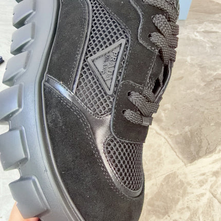 PRADA 26S GEAR SOLE SNEAKERS IN BLACK SUEDE AND MESH