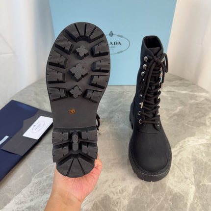PRADA 26S LACE-UP COMBAT BOOTS IN BLACK CANVAS