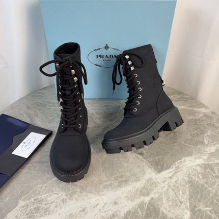 PRADA 26S LACE-UP COMBAT BOOTS IN BLACK CANVAS