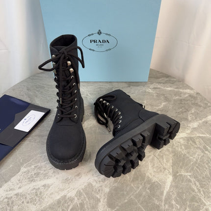 PRADA 26S LACE-UP COMBAT BOOTS IN BLACK CANVAS