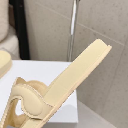 CELINE 26S TRIOMPHE SLIDES IN PASTEL YELLOW CALFSKIN