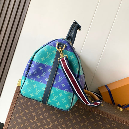 LV 26S KEEPALL 50 IN BLUE WITH LIGHT BLUE ACCENTS COATED CANVAS