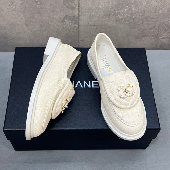 CHANEL 26S LOAFERS IN IVORY WHITE CANVAS WITH QUILTED FLAP & CHAIN CC LOGO