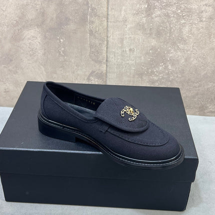 CHANEL 26S LOAFERS IN BLACK CANVAS WITH QUILTED FLAP & CHAIN CC LOGO