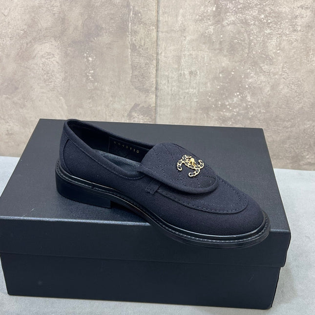CHANEL 26S LOAFERS IN BLACK CANVAS WITH QUILTED FLAP & CHAIN CC LOGO