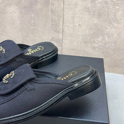 CHANEL 26S MULE LOAFERS IN BLACK CANVAS WITH QUILTED FLAP & CHAIN CC LOGO