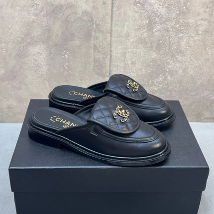 CHANEL 26S MULE LOAFERS IN BLACK QUILTED CALFSKIN WITH CC LOGO