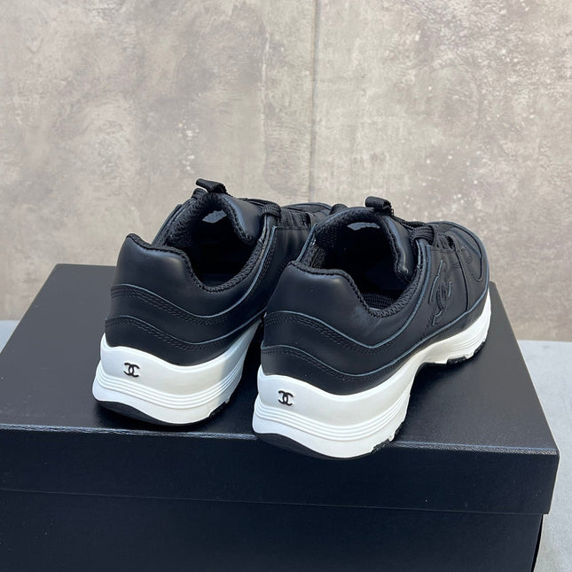 CHANEL 26S RUNNER CC LOGO SNEAKERS IN BLACK CALFSKIN