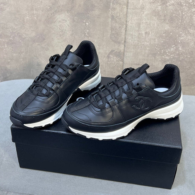 CHANEL 26S RUNNER CC LOGO SNEAKERS IN BLACK CALFSKIN