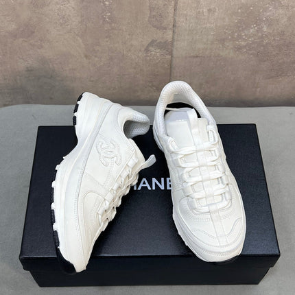 CHANEL 26S RUNNER CC LOGO SNEAKERS IN WHITE CALFSKIN