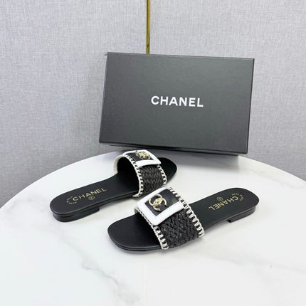 CHANEL 26S WOVEN STRAP SLIDES IN BLACK LAMBSKIN