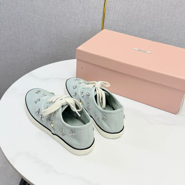 MIUMIU 26S EMBELLISHED SNEAKERS IN LIGHT BLUE FABRIC