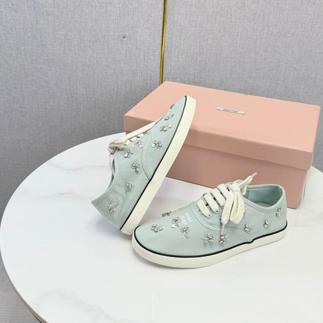 MIUMIU 26S EMBELLISHED SNEAKERS IN LIGHT BLUE FABRIC