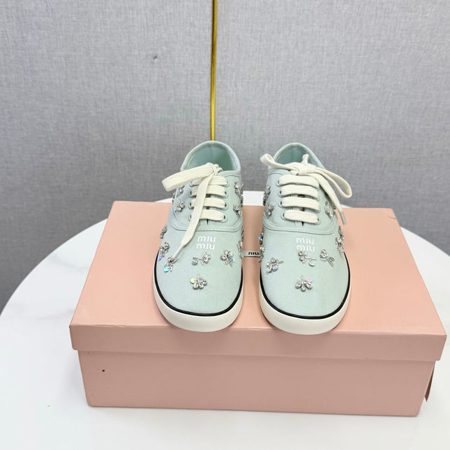 MIUMIU 26S EMBELLISHED SNEAKERS IN LIGHT BLUE FABRIC