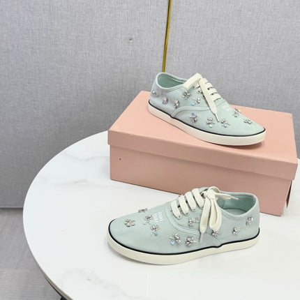 MIUMIU 26S EMBELLISHED SNEAKERS IN LIGHT BLUE FABRIC
