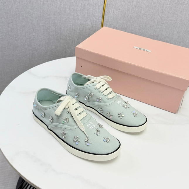 MIUMIU 26S EMBELLISHED SNEAKERS IN LIGHT BLUE FABRIC