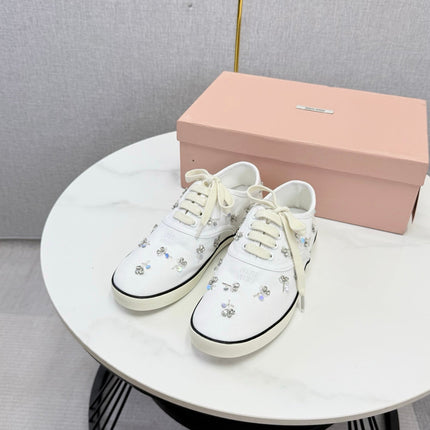 MIUMIU 26S EMBELLISHED SNEAKERS IN WHITE FABRIC