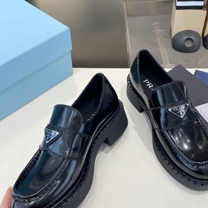 PRADA 26S LOAFERS IN BLACK CALFSKIN WITH LOGO SILVER HARDWARE