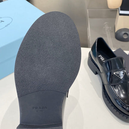 PRADA 26S LOAFERS IN BLACK CALFSKIN WITH LOGO SILVER HARDWARE