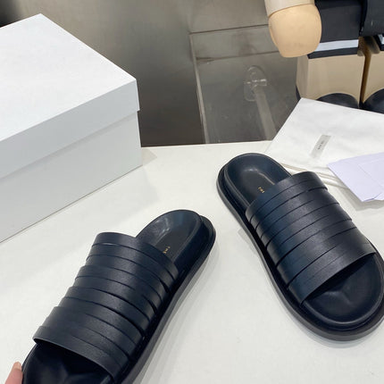 THE ROW 26S MULTI STRAP SLIDES IN BLACK CALFSKIN