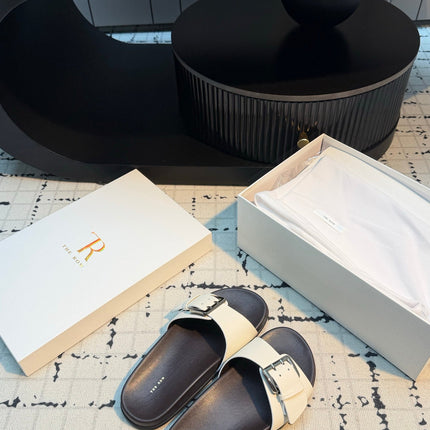 THE ROW 26S BUCKLE SLIDE SANDALS IN WHITE CALFSKIN