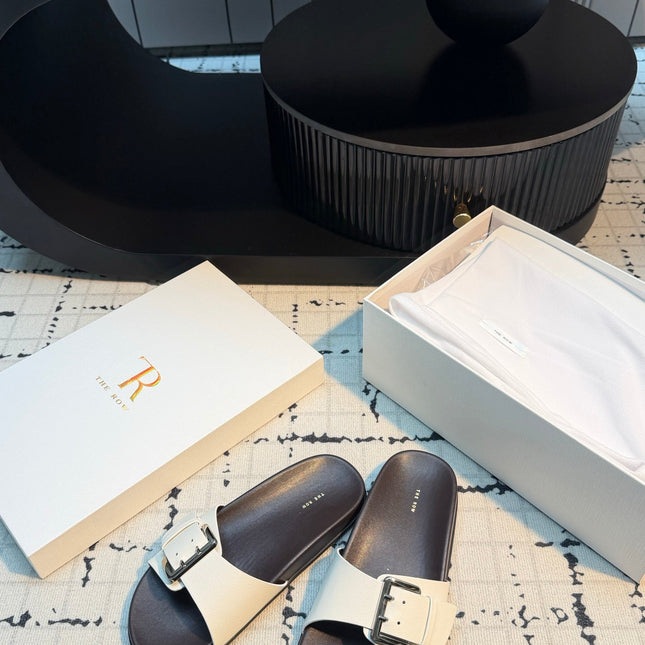 THE ROW 26S BUCKLE SLIDE SANDALS IN WHITE CALFSKIN