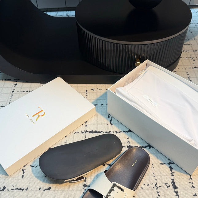 THE ROW 26S BUCKLE SLIDE SANDALS IN WHITE CALFSKIN